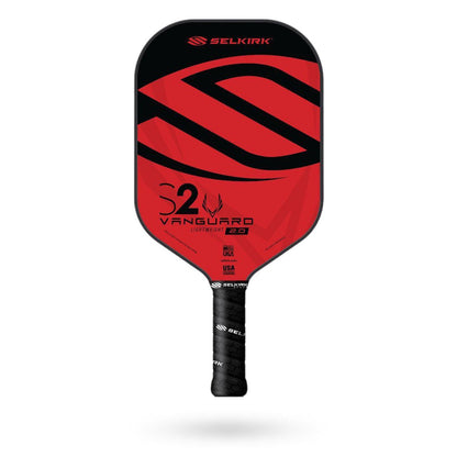 A Pickleballist Selkirk Vanguard S2 pickleball paddle with the largest surface area, featuring a glossy red and black geometric design and a black grip, against a white background.