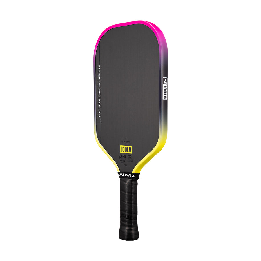 The JOOLA Magnus 3S Dual 14mm Pickleball Paddle features a black Charged Carbon Surface, a gradient pink, purple, and yellow edge, and is shown on a white background.