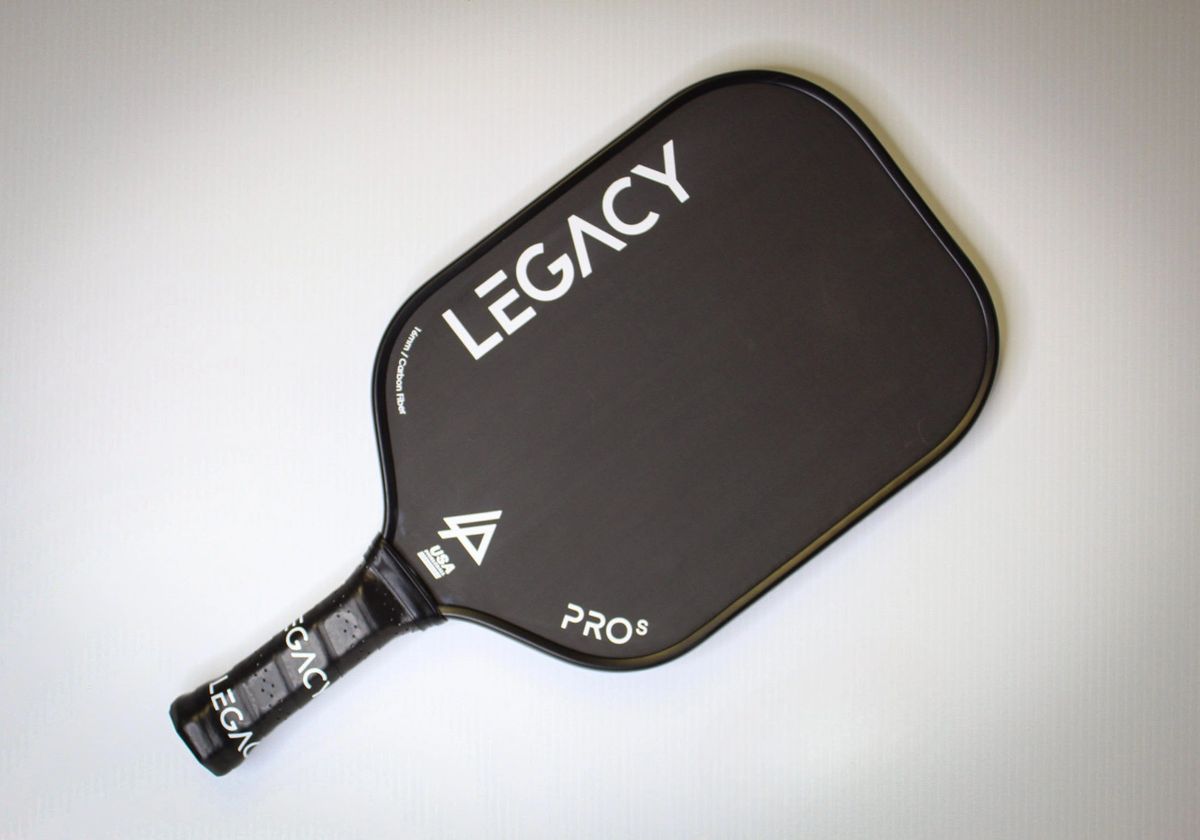 The Legacy Pro S Pickleball Paddle by Legacy is black, featuring "LEGACY" in white across the face and "PRO S" near the bottom.