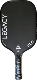 A black paddle with the word Legacy Pro on it.