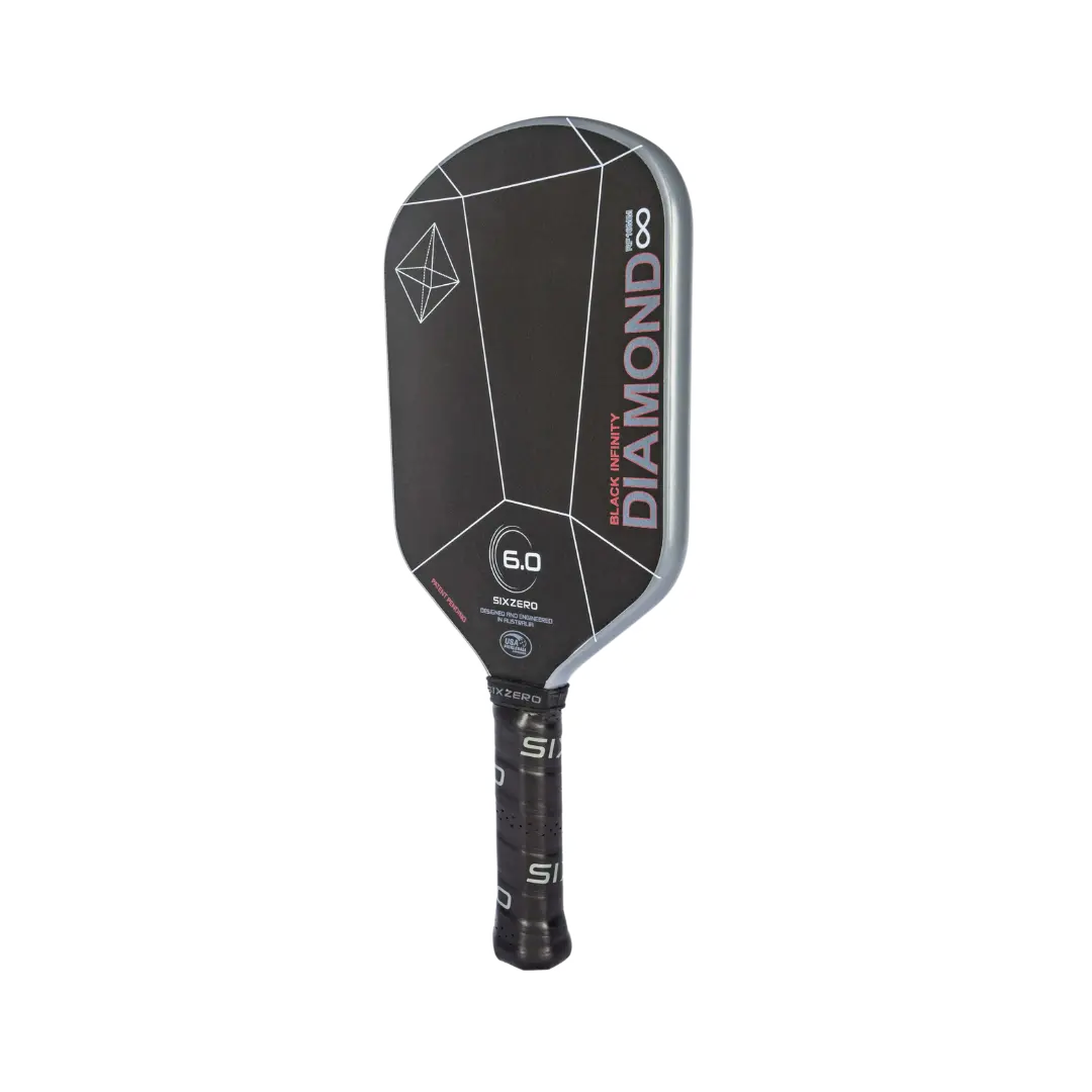 A black and white pickleball paddle with geometric designs, labeled "Six Zero Infinity Edgeless Black Diamond Power (16mm) Pickleball Paddle," featuring a textured grip handle.