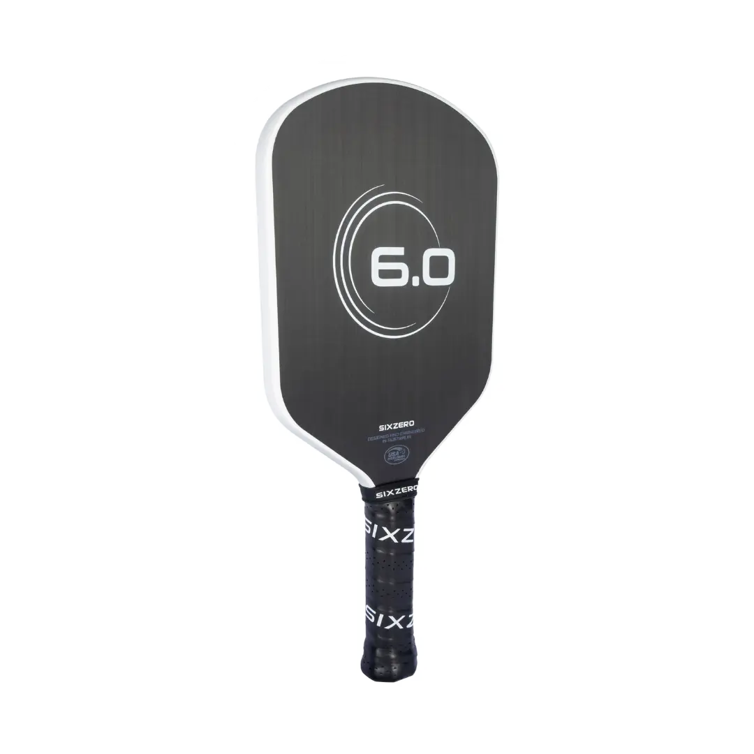 A Six Zero black and white paddle with the word 60 on it.