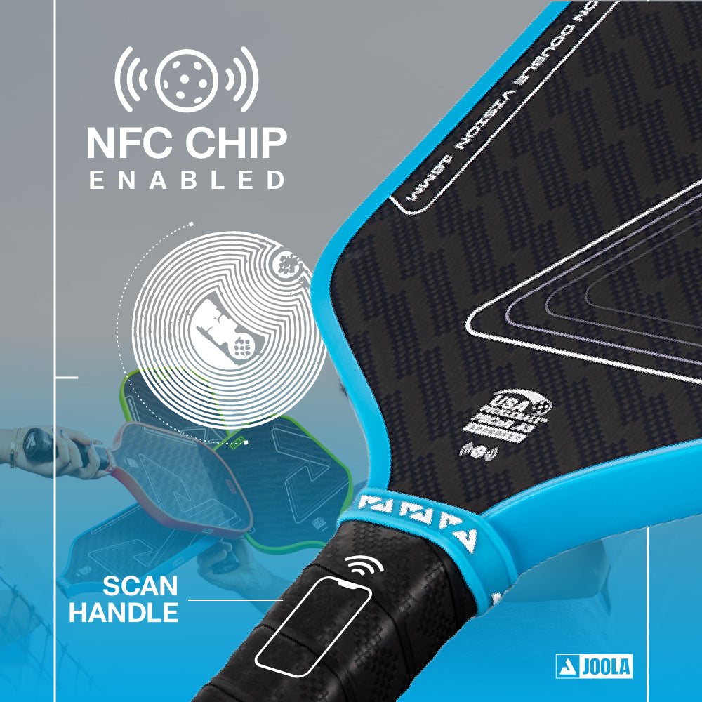 Close-up of the JOOLA Double Vision Hyperion 16mm Pickleball Paddle showing its NFC chip feature, with scan instructions on the handle and a faint player in the background.