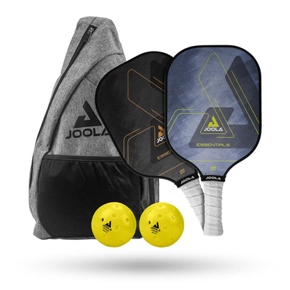 The JOOLA Essentials Paddles, Balls, and Bag Set featuring two paddles with a multi-layer fiberglass design, two yellow balls, and a gray carrying bag with the JOOLA logo.