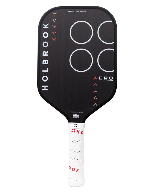 The Holbrook Pro - Aero T 16mm Pickleball Paddle features a black design with "Holbrook" branding, a white grip, and circular patterns on the paddle face.