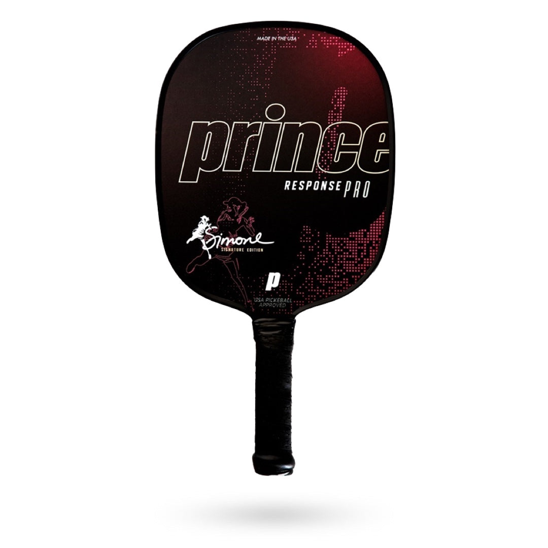 A black and red Prince Response Pro pickleball paddle with sweet spot.