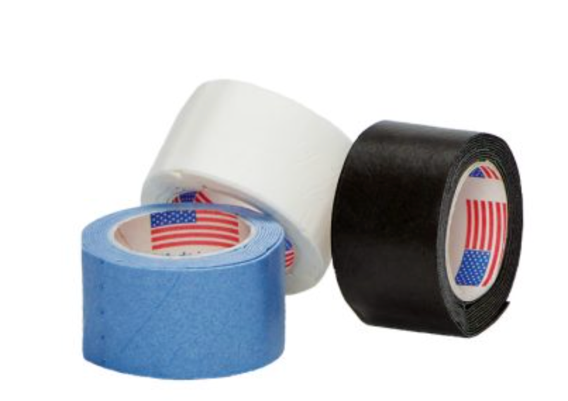 Three rolls of Tourna Pickleball MEGA TAC® Overgrip Grip Tape - Single Overgrip, one blue, one white, and one black, are stacked together with American flag patterns visible inside the rolls.