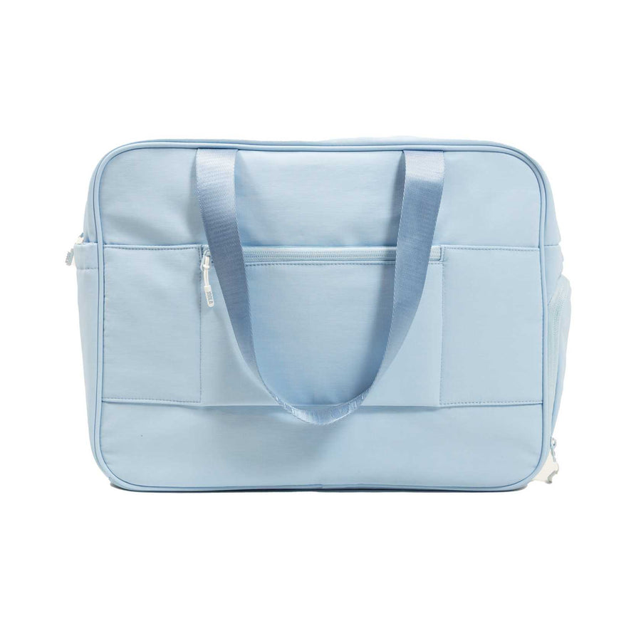 The JOOLA Overnighter Puff Bag by JOOLA is a light blue rectangular tote with two handles, front pockets, and a zipper closure, featuring durable construction. Shown against a plain white background.