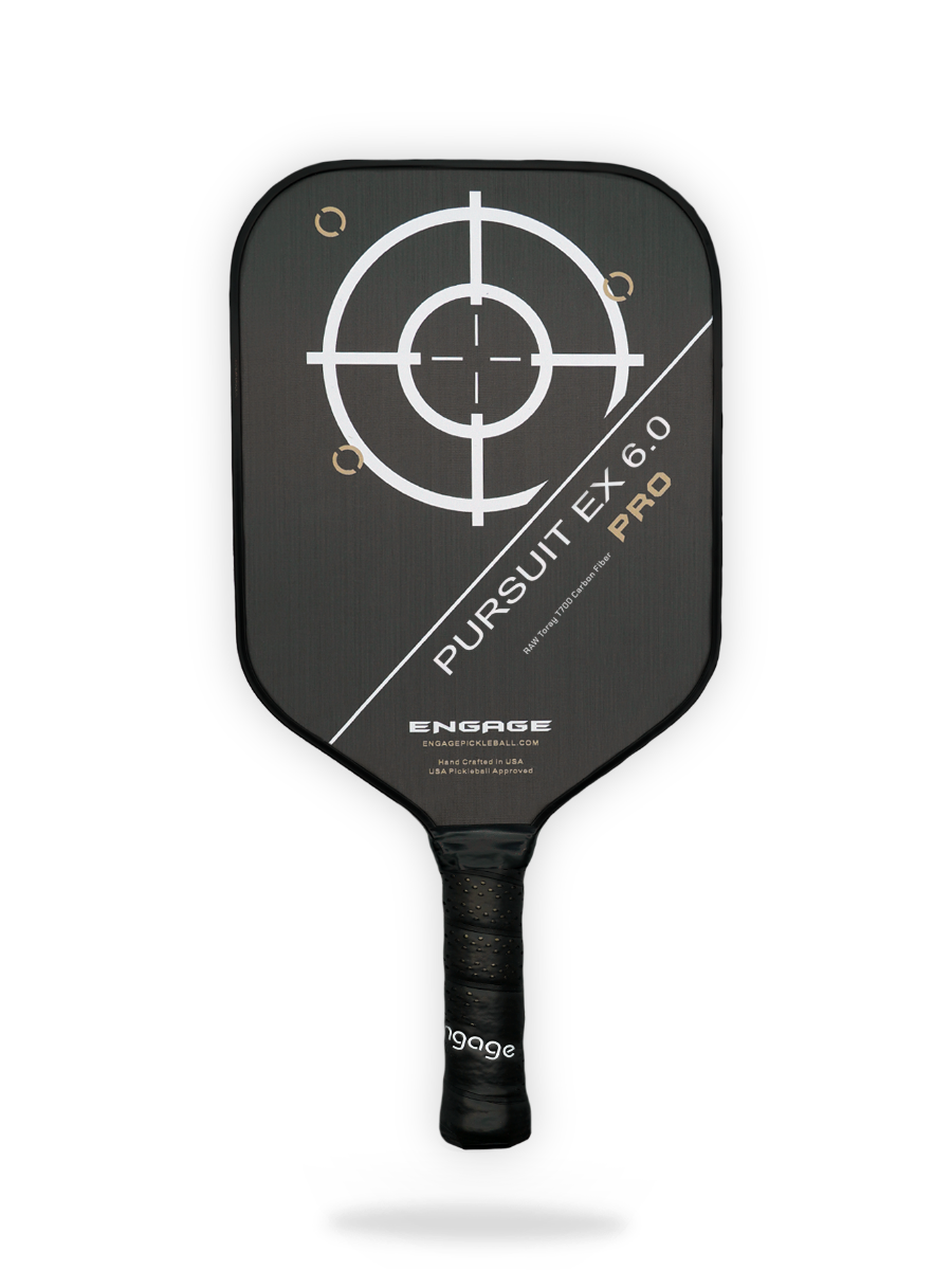 An Engage Pursuit Pro EX 6.0 Pickleball Paddle with a target on it.