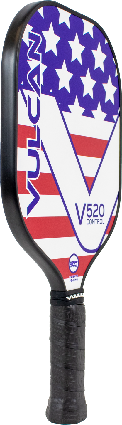 A Pickleballist Vulcan V520 Control pickleball paddle with a pattern of white stars on blue at the top and red and white stripes at the bottom, resembling the U.S. flag.