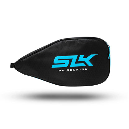 A black case with blue "SLK" and "BY SELKIRK" text on its side, used for storing and protecting items, featuring a zip closure and a hexagonal pattern, known as the Selkirk SLK Pickleball Paddle Cover by Selkirk.