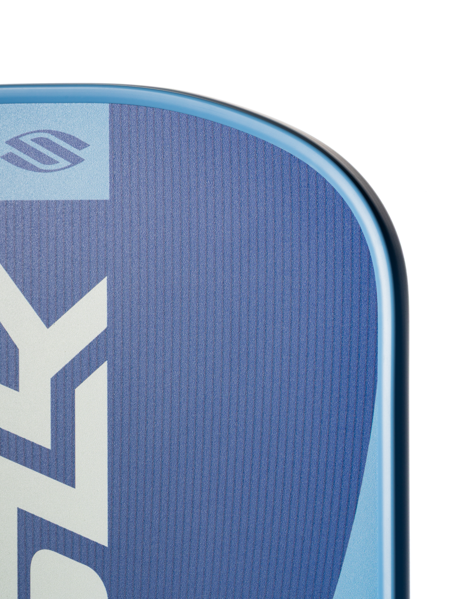 Close-up of the top corner of the Selkirk SLK Valkyrie Widebody 16mm Pickleball Paddle featuring a blue surface, smooth curved edge, and white geometric patterns.