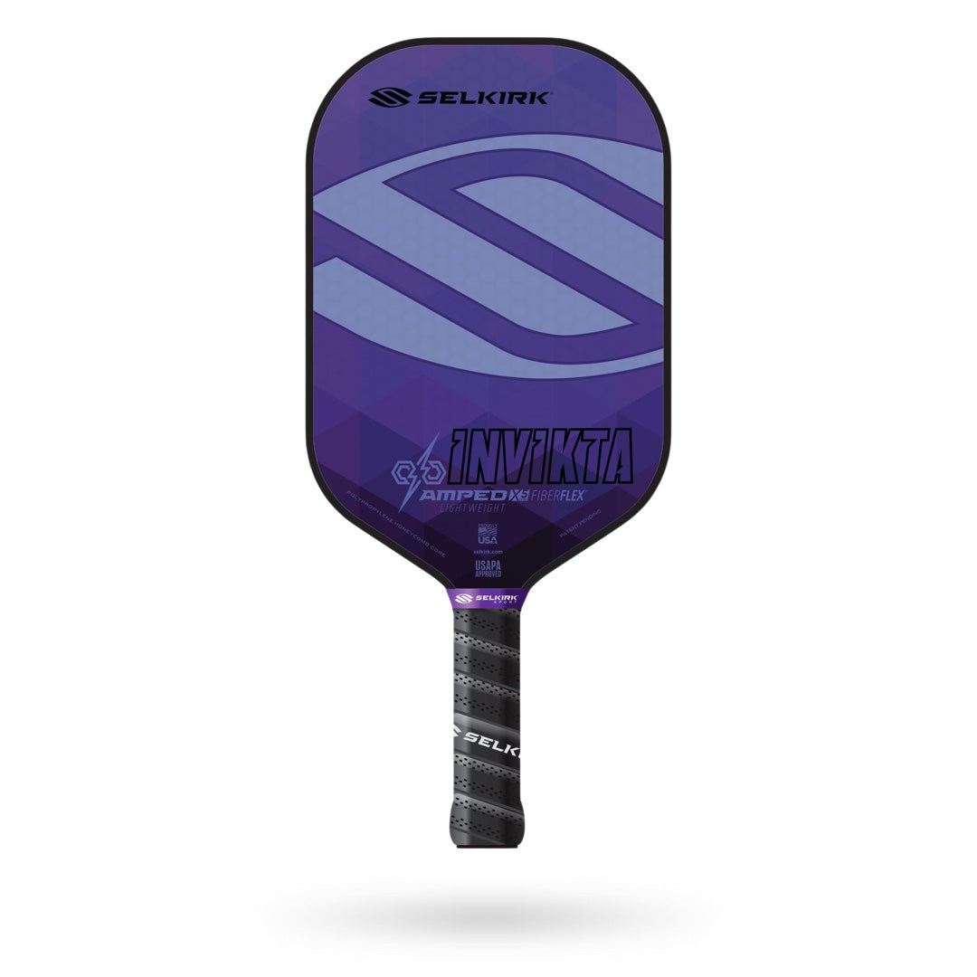A purple and black Selkirk Amped Invikta Pickleball Paddle on a white background.