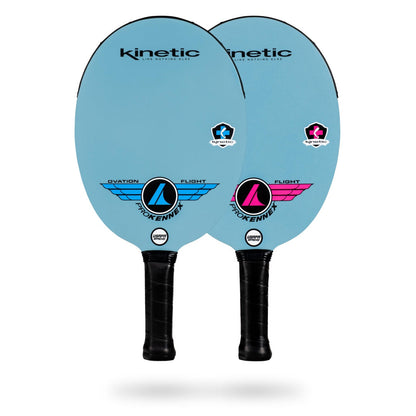 Two blue ProKennex Kinetic Ovation Flight Pickleball Paddles with black handles, featuring logos and the brand 'ProKennex' at the top. The paddle on the left displays 'Ovation' and 'Flight' graphics, while the one on the right has 'Flight' graphics. These USAPA Sanctioned Tournament paddles boast a Carbon with diamond frost face for enhanced play.