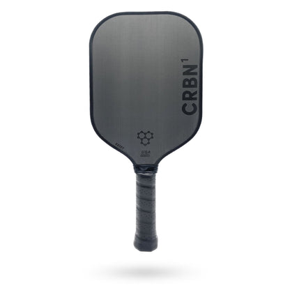 A gray carbon fiber CRBN 1 - 16mm Pickleball paddle isolated on a white background, labeled "crbn" with a grip wrapped in black material.