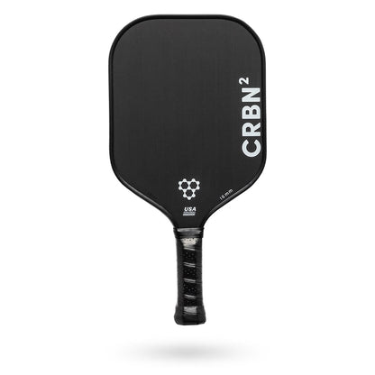 Black Pickleballist CRBN 2 paddle with logo and textured surface, isolated on a white background.