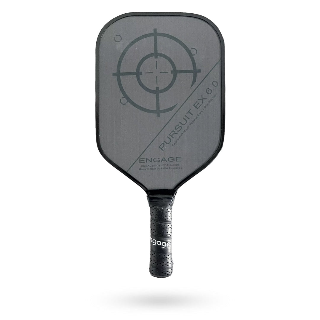 A black Engage Pursuit EX 6.0 Pickleball Paddle with a target design on the face and the text "Pursuit EX 6.0" and "Engage" printed on it. The handle is wrapped in black grip tape.