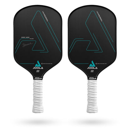 Two black Pickleballist Simone Jardim Hyperion CFS 16 pickleball paddles with aqua accents and white wrapped grips, featuring a reactive honeycomb polymer core, displayed against a white background.