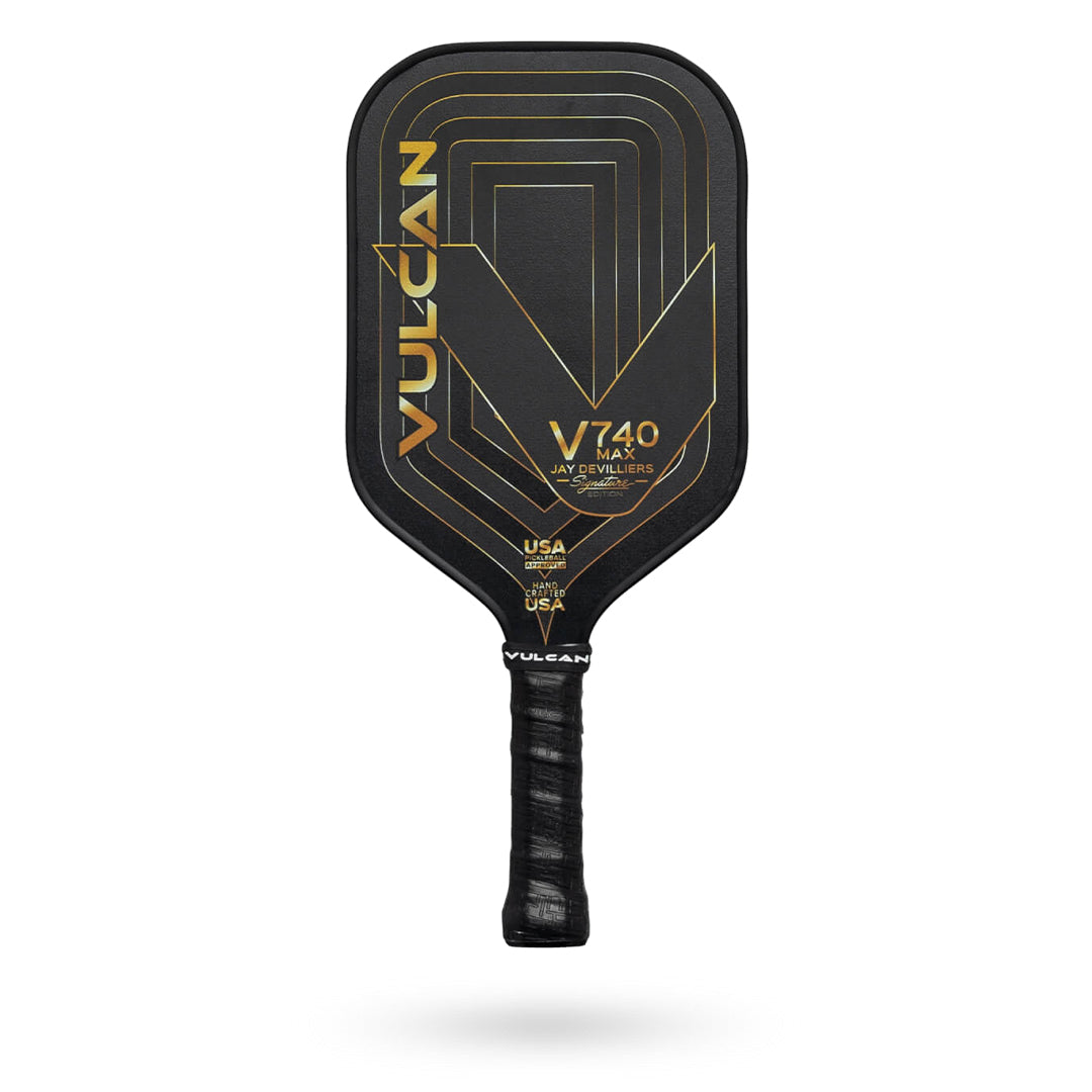 A black Vulcan V740 MAX - Jay Devilliers Signature Pickleball Paddle with gold and grey geometric designs, featuring a cushioned handle and distinctive Vulcan logo.