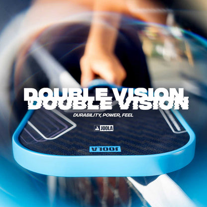 A person grips a blue-edged JOOLA Double Vision Scorpeus 16mm Pickleball Paddle with "DOUBLE VISION" and "DURABILITY, POWER, FEEL" overlaid—ideal for advanced players seeking top performance from JOOLA.