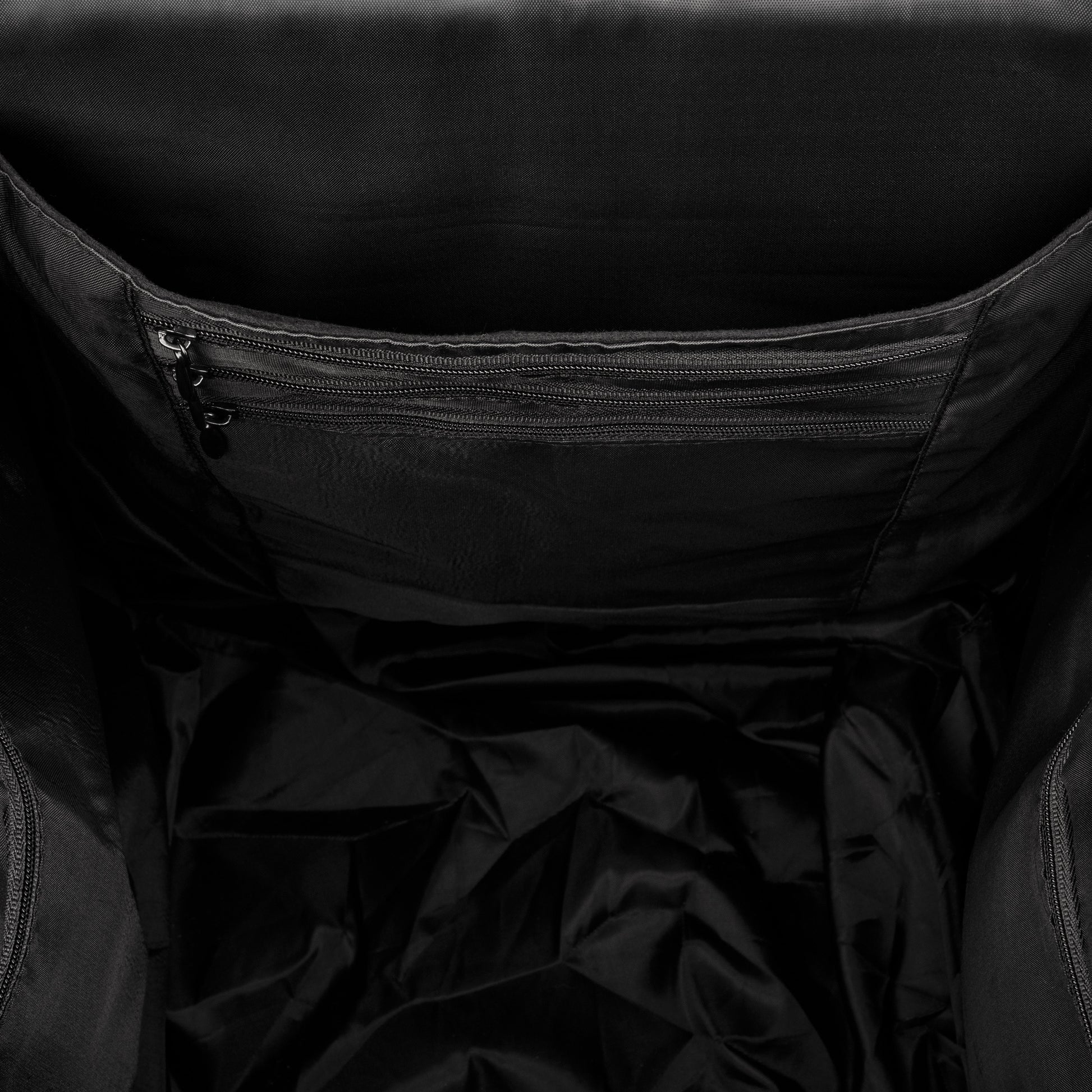 The inside of a Selkirk Core Series Team Backpack Pickleball Bag with a zipper.