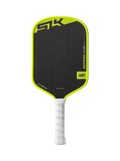 The Selkirk SLK ERA Power Elongated Carbon Fiber Pickleball Paddle features a black and neon yellow design with geometric patterns, a white perforated grip, and Selkirk branding on the face.