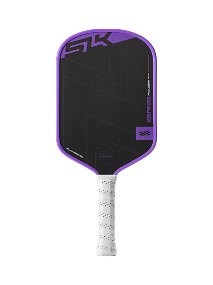 The Selkirk SLK ERA Power Elongated Carbon Fiber Pickleball Paddle features a black face, purple border, white perforated grip, and displays the SK logo, delivering enhanced performance.