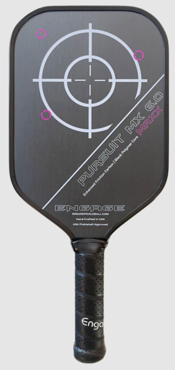 Engage Pursuit MAXX MX 6.0 Pickleball Paddle with white and purple graphics, featuring a target design and the text "pursuit mx 6.0" on the face, and the Engage brand logo on the handle.