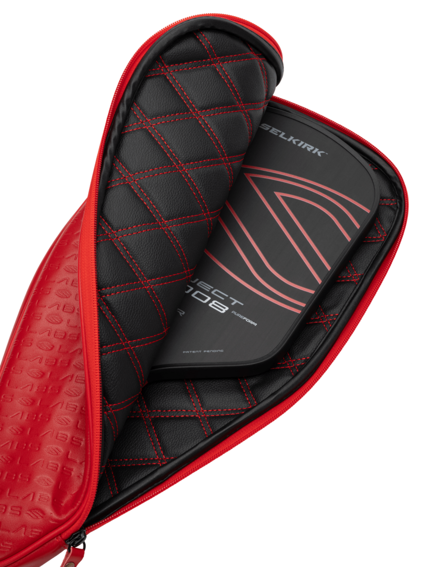 The Selkirk Labs Project 008 Invikta Elongated 13mm Pickleball Paddle, featuring a sleek black design with red accents, is partially visible inside its matching black and red quilted case.