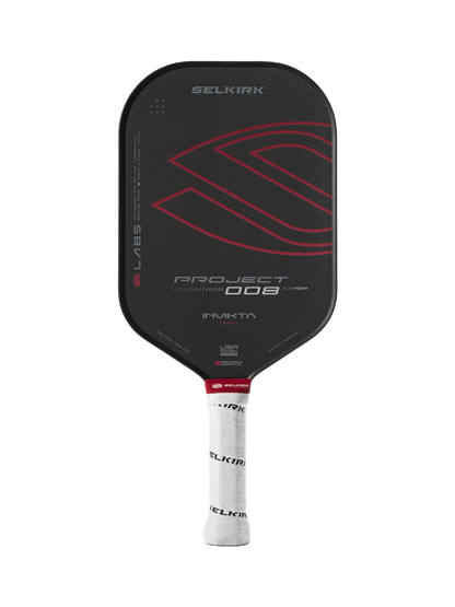 A black and red Selkirk Labs Project 008 Invikta pickleball paddle with "Invikta" on the face and a white handle featuring "Selkirk.