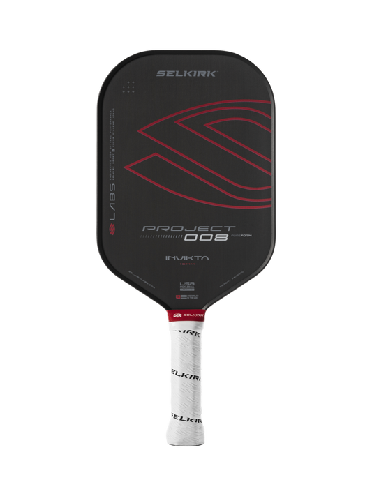 A black and red Selkirk Labs Project 008 Invikta pickleball paddle with "Invikta" on the face and a white handle featuring "Selkirk.