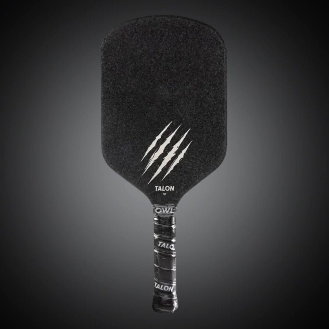 A black OWL Talon X1 Quiet Pickleball Paddle with claw mark graphics and "OWL" branding on the face, designed for advanced spin control, shown against a dark gradient background.