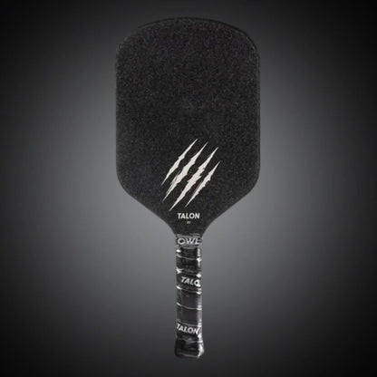 A black OWL Talon X1 Quiet Pickleball Paddle with claw mark graphics and "OWL" branding on the face, designed for advanced spin control, shown against a dark gradient background.