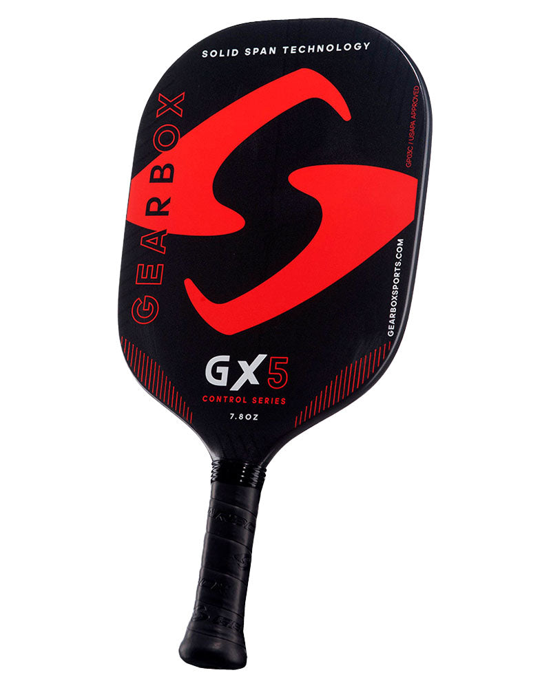 A red and black Gearbox GX5 Pickleball Paddle known for its soft feel and preferred by players seeking an upgraded feel, set against a crisp white background.