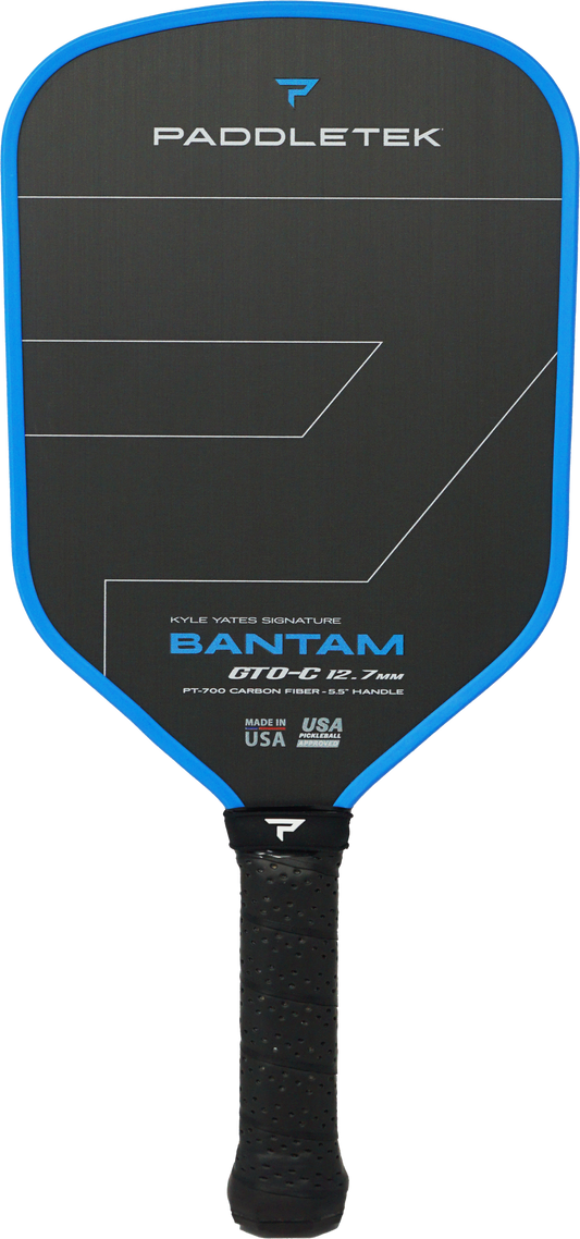 The Paddletek Bantam GTO-C 12.7mm Carbon Fiber Pickleball Paddle features a black surface, blue edges, and black grip, with branded and signature details on the face.