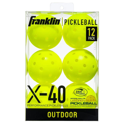 Box of Franklin X-40 Outdoor Pickleball Balls includes 12 neon yellow balls with machine-drilled holes. Labeled "Official Ball of US Open Pickleball Championships," these USAPA-approved balls by Franklin provide top-tier court performance.
