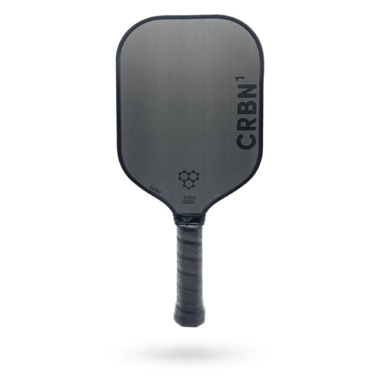 A CRBN 1 - 16mm Pickleball paddle with the text 'crbn' on the surface, featuring a textured handle, against a white background.