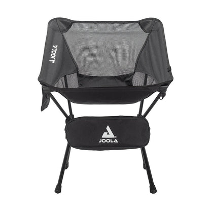 A front view of the JOOLA Compact Portable Chair, a black chair with mesh backrest, storage pouch, and four legs by JOOLA.