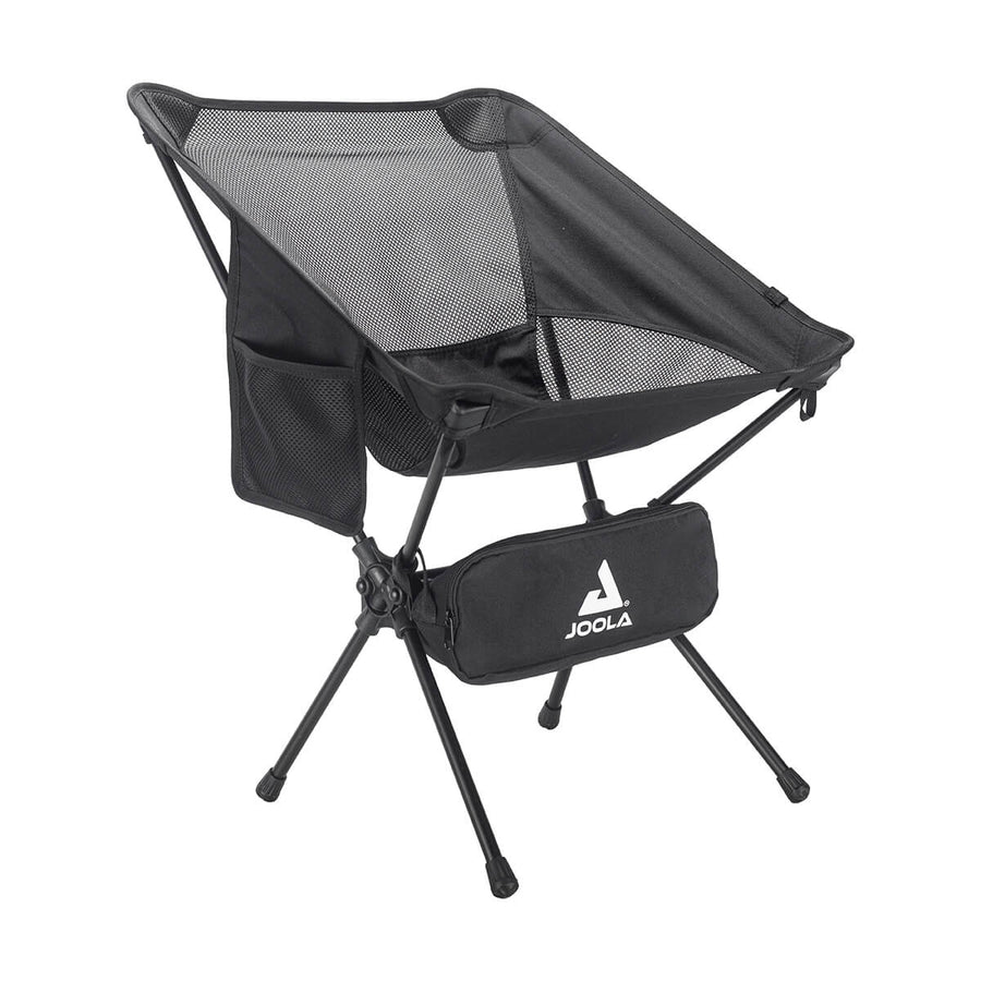 The JOOLA Compact Portable Chair is a black folding camping chair with a mesh back, side storage pocket, and a zippered front pouch labeled "JOOLA.