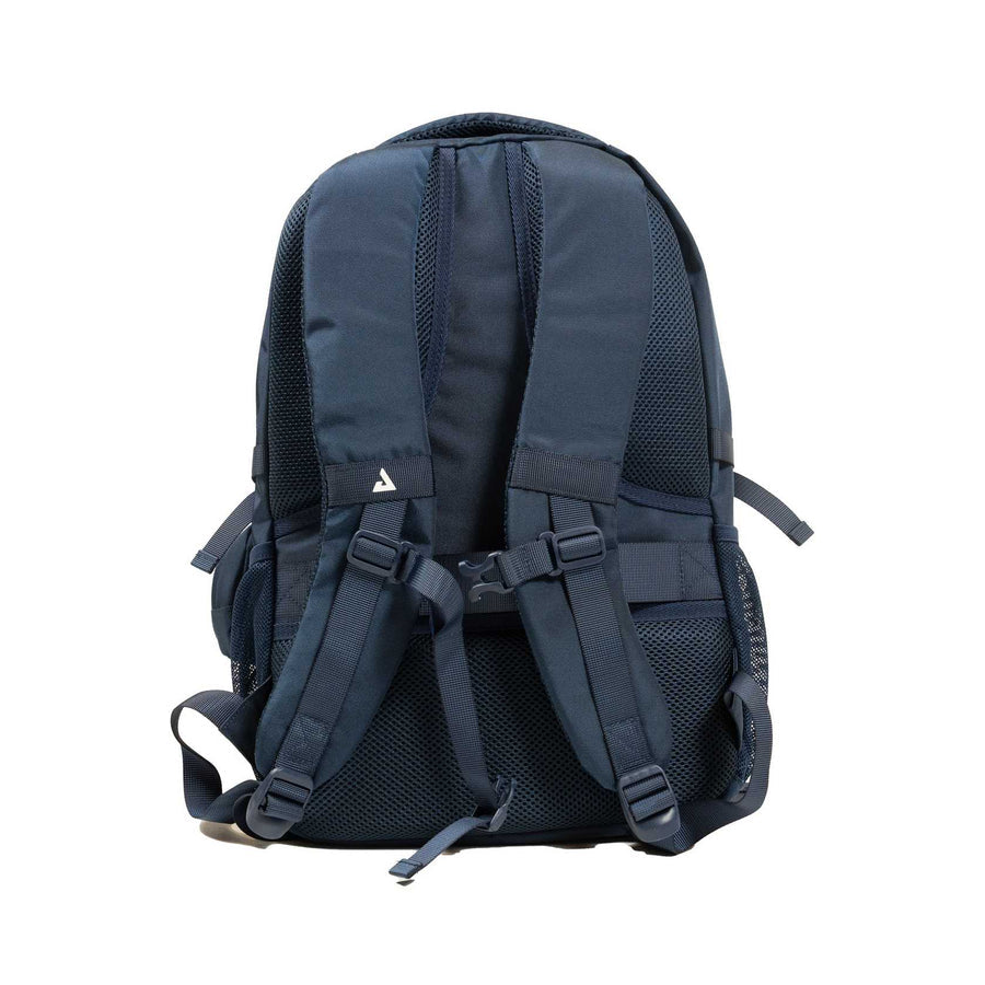 The JOOLA Utility Backpack by JOOLA is shown from the back in navy blue, highlighting its padded shoulder straps, sternum strap, mesh back panel, and side pockets—perfect for pickleball—against a white background.