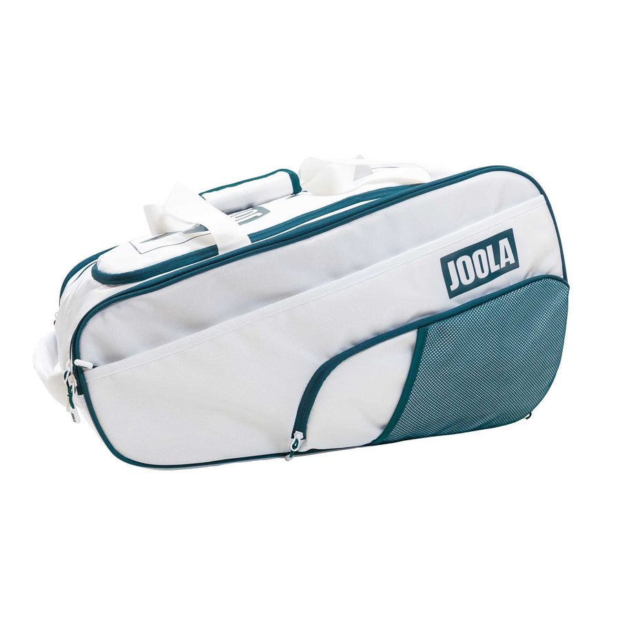 The Pickleballist 2026 Tour Elite Pro Pickleball Bag in white and teal features a zippered main compartment, side mesh pocket, and dual handles—ideal for tournament players carrying essential court gear.