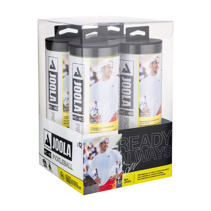 A clear box contains twelve Pickleballist JOOLA HC-40 Pickleballs - Shock Yellow, with branding, product details, and a smiling athlete image displayed on the packaging.
