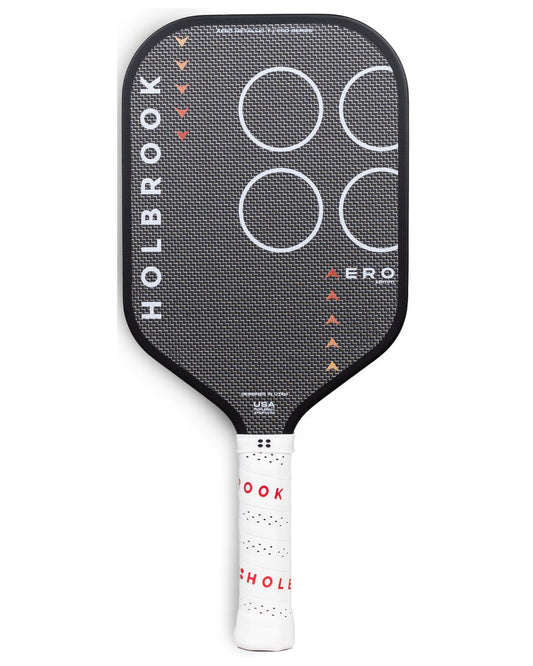 A black Holbrook Pro - Aero Metallic T 16 mm pickleball paddle, displaying "Holbrook" and "Aero" on the face, adorned with circular patterns and equipped with a white grip handle.