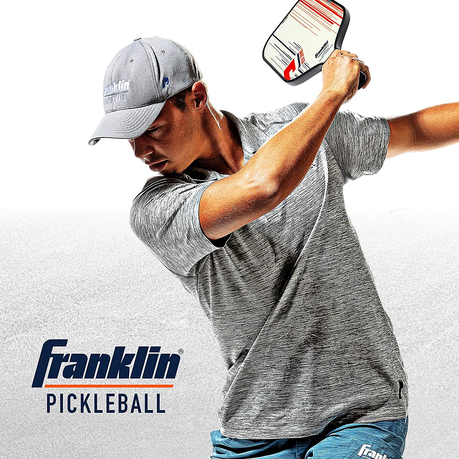 Franklin pickleball - a man swinging a pickleball.