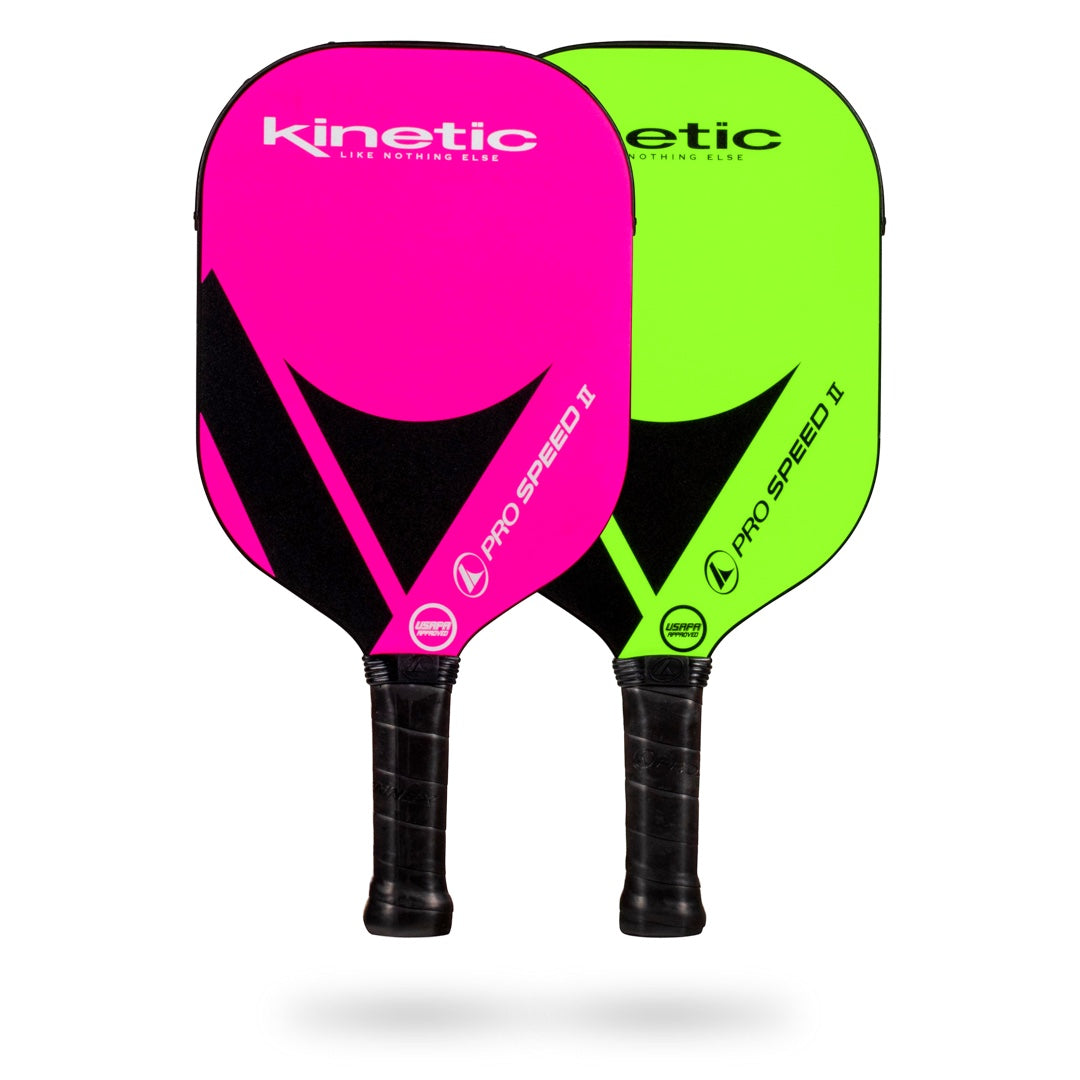 Two Pickleballist ProKennex Kinetic Pro Speed II pickleball paddles, one pink and one green, with the kinetic system technology logo and "pro speed ii" text, isolated on a white background.