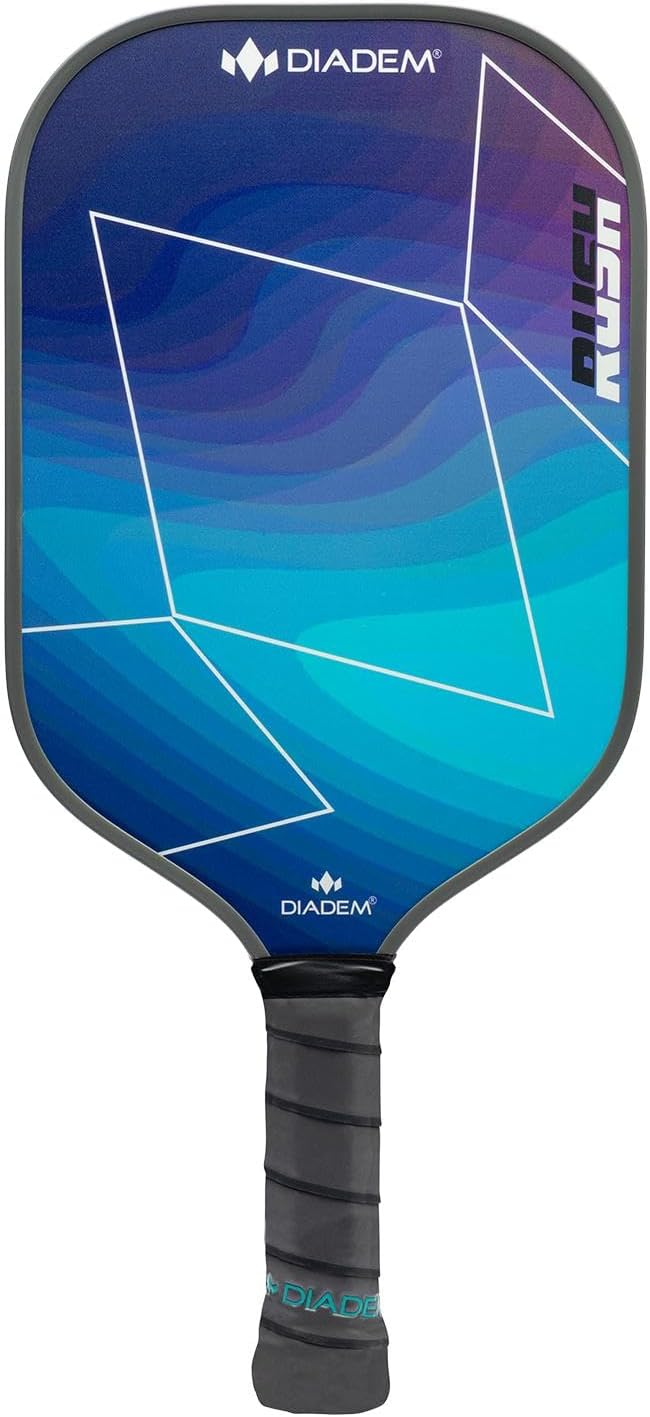 A Diadem Rush Pickleball Paddle showcasing a geometric blue and purple design, complete with a black handle that features a textured grip. The brand name "Diadem" and the model name "Rush" are prominently displayed on the face.