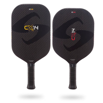 Two black Gearbox CX14 Pickleball Paddles with carbon fiber texture and thicker honeycomb design. Each paddle has "CX14 Elongated" printed prominently on the face along with branded Gearbox graphics. These paddles feature Gearbox SST Technology and have ergonomic black grips.