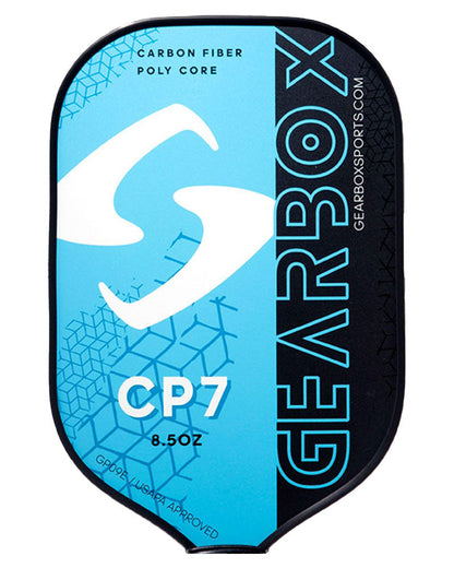 A blue and black Gearbox CP7 Pickleball Paddle, featuring a carbon fiber poly core, "8.5 OZ," and a carbon fiber face with "USAPA approved" written on it. The brand name "Gearbox" is prominently displayed, ensuring top-tier performance for your game.