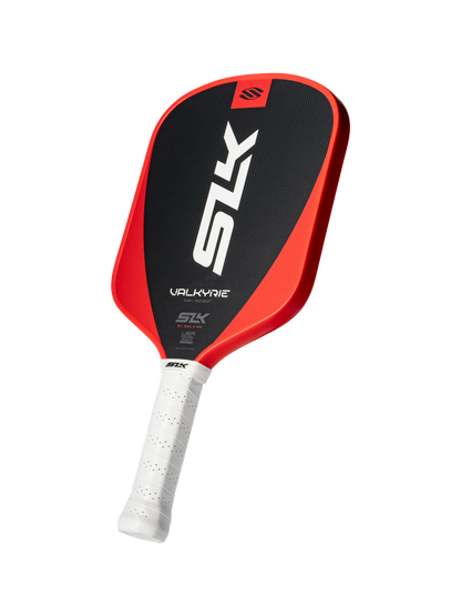The Selkirk SLK Valkyrie Widebody 16mm Pickleball Paddle features a red and black design, white grip, widebody shape, and bold Selkirk branding displayed on the paddle face against a plain background.