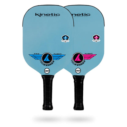 Two USAPA-approved Pickleballist ProKennex Kinetic Pro Flight pickleball paddles, one blue and one pink, displayed against a white background.